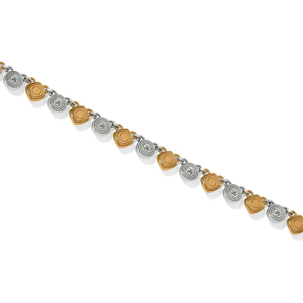 NECKLACE with alternating gold and silver circular beads on a white background