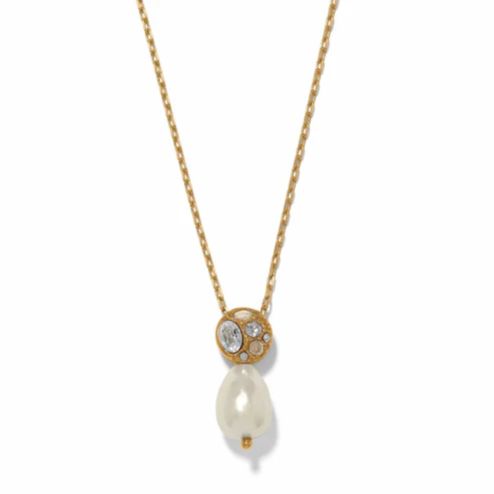A gold chain necklace featuring a circular gold pendant with small clear stones and a dangling white pearl drop, shown on a plain white background.