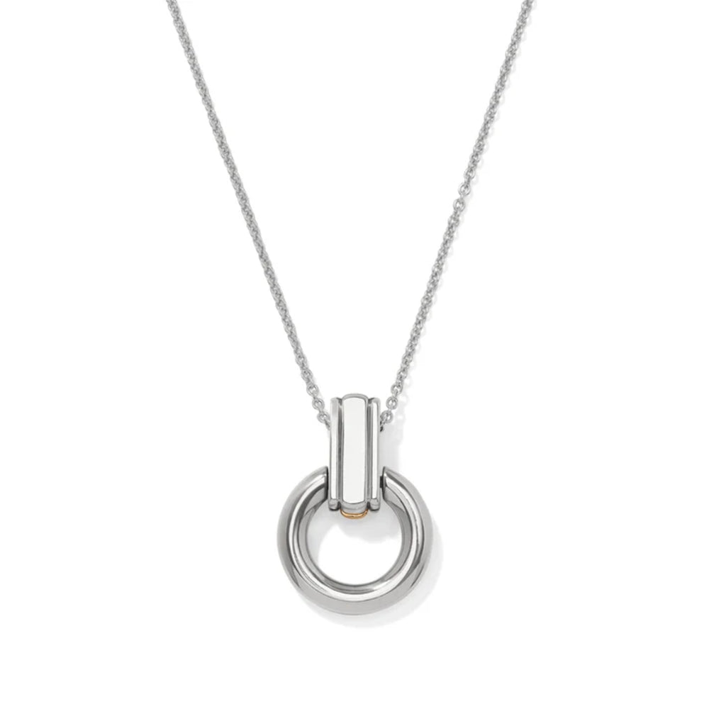 A silver pendant necklace featuring a polished cylindrical bar connected to a thick circular ring, suspended from a delicate silver chain against a white background.