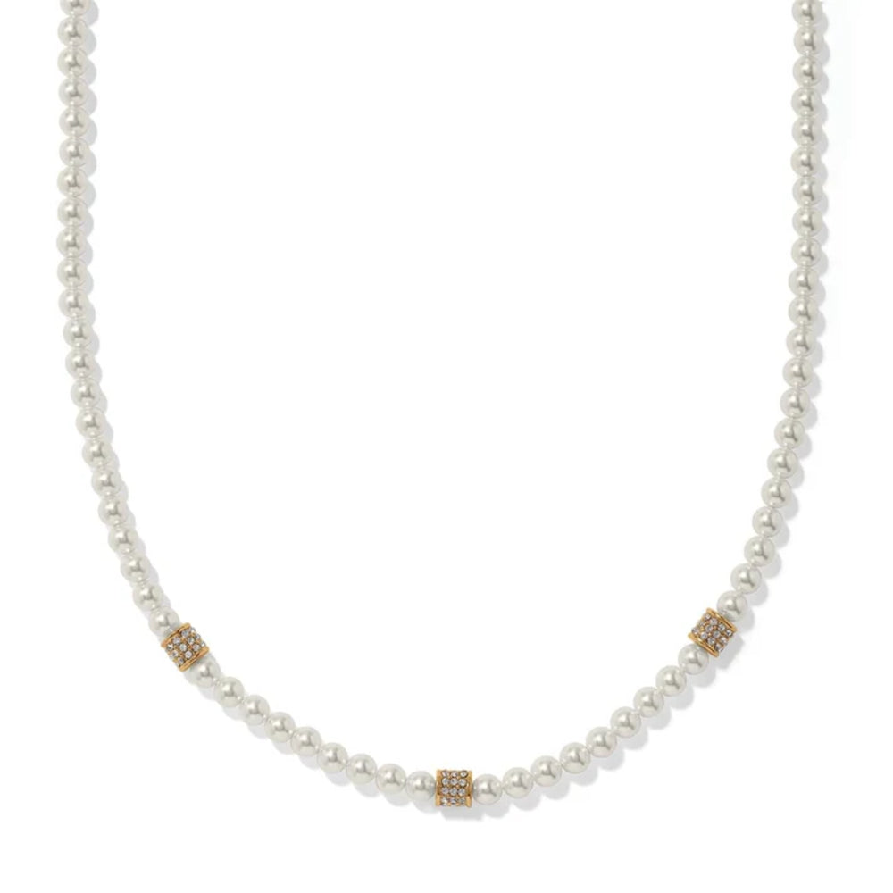 A white pearl necklace with three gold square spacers set with small clear stones, shown against a plain white background.