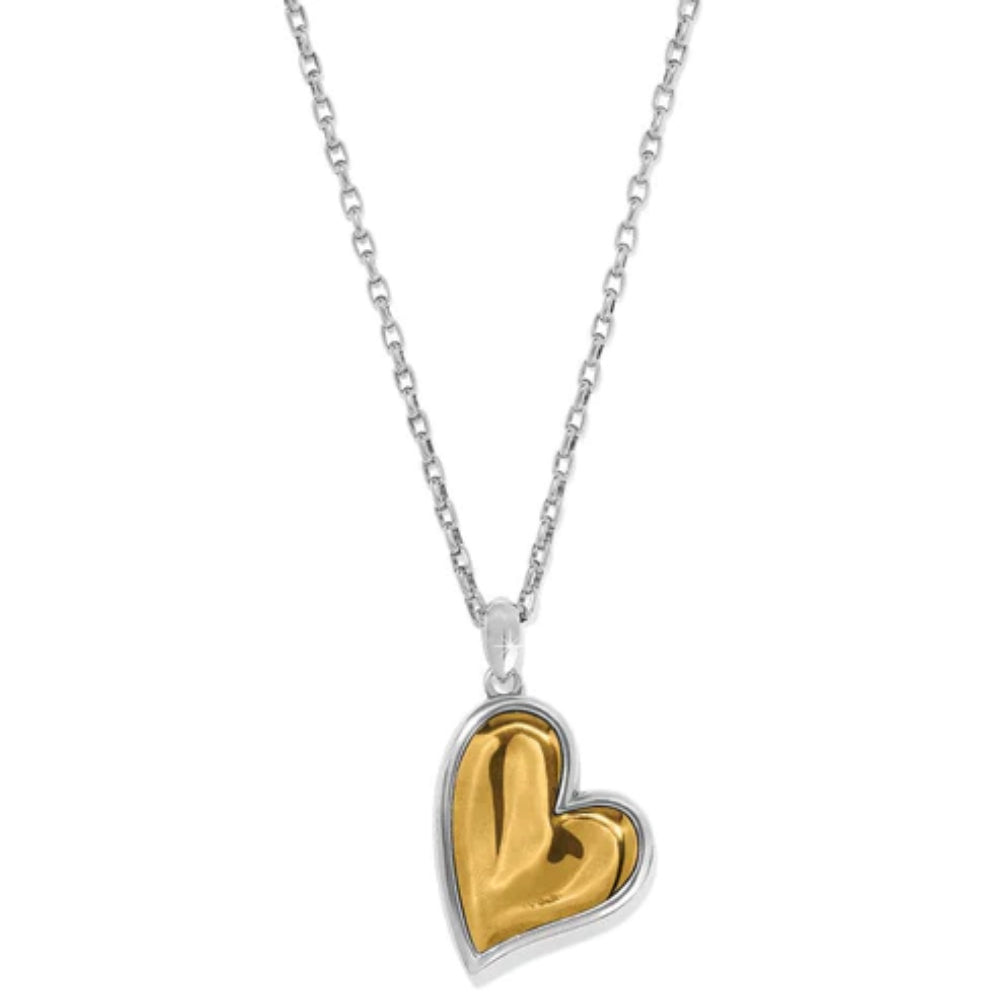 Heart-shaped pendant with gold center and silver outline on a white background