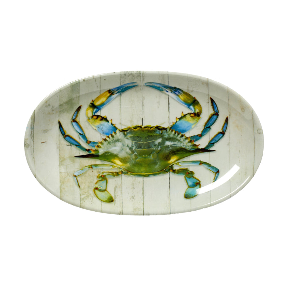 Decorative plate with a blue crab design on a white background
