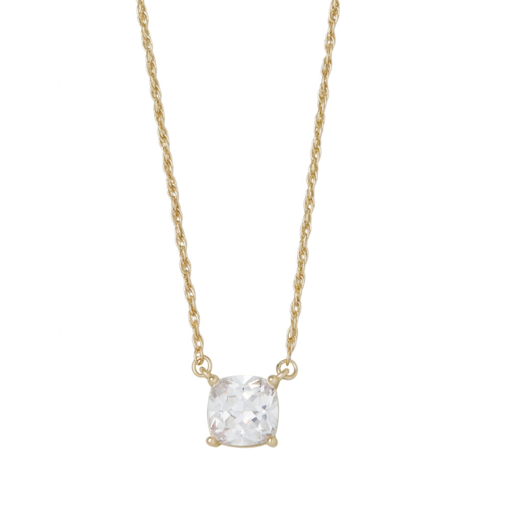 A delicate gold chain necklace featuring a cushion-cut clear gemstone pendant in a four-prong setting, shown against a plain white background.