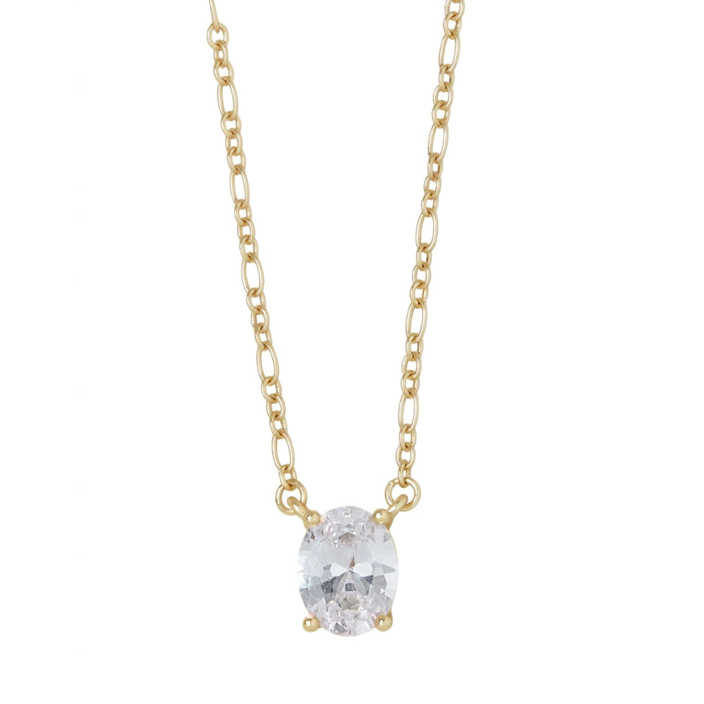 A delicate gold chain necklace featuring an oval-cut clear gemstone pendant in a four-prong setting, shown against a plain white background.