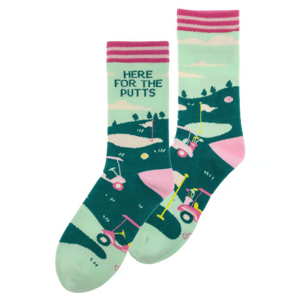 Golf-themed socks with a landscape design and text on a white background.