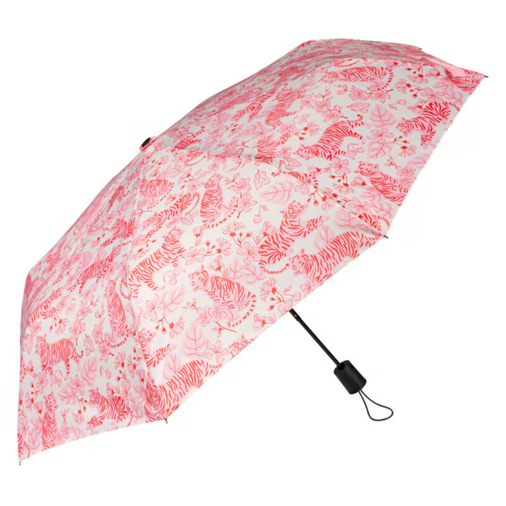 Pink and white patterned umbrella on a white background.