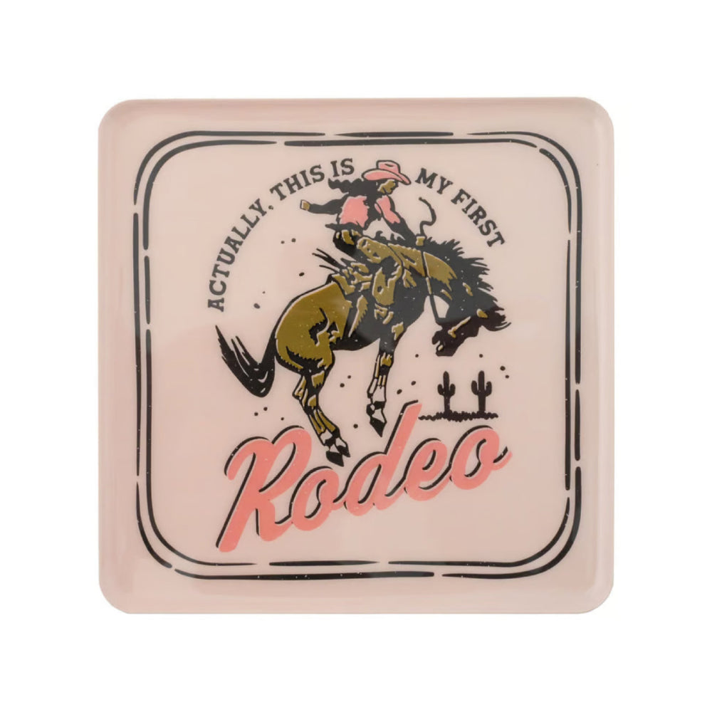 A square metal tray with rounded corners featuring a vintage western design. The design shows a cowboy riding a bucking horse with the text 'ACTUALLY, THIS IS MY FIRST Rodeo' in black and pink lettering, set against a pale pink background.