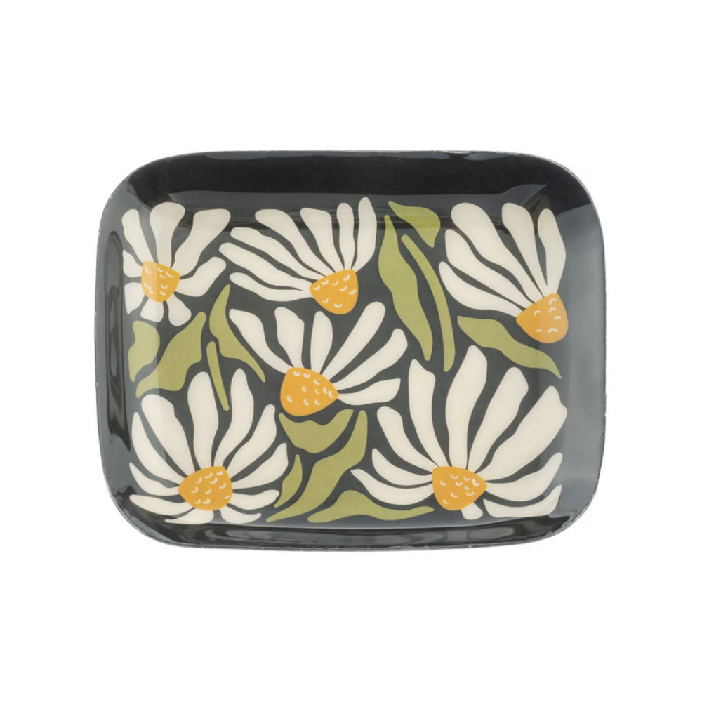 A rectangular metal tray with rounded corners, featuring a hand-painted floral pattern of white daisies with yellow centers and green leaves on a dark charcoal background.