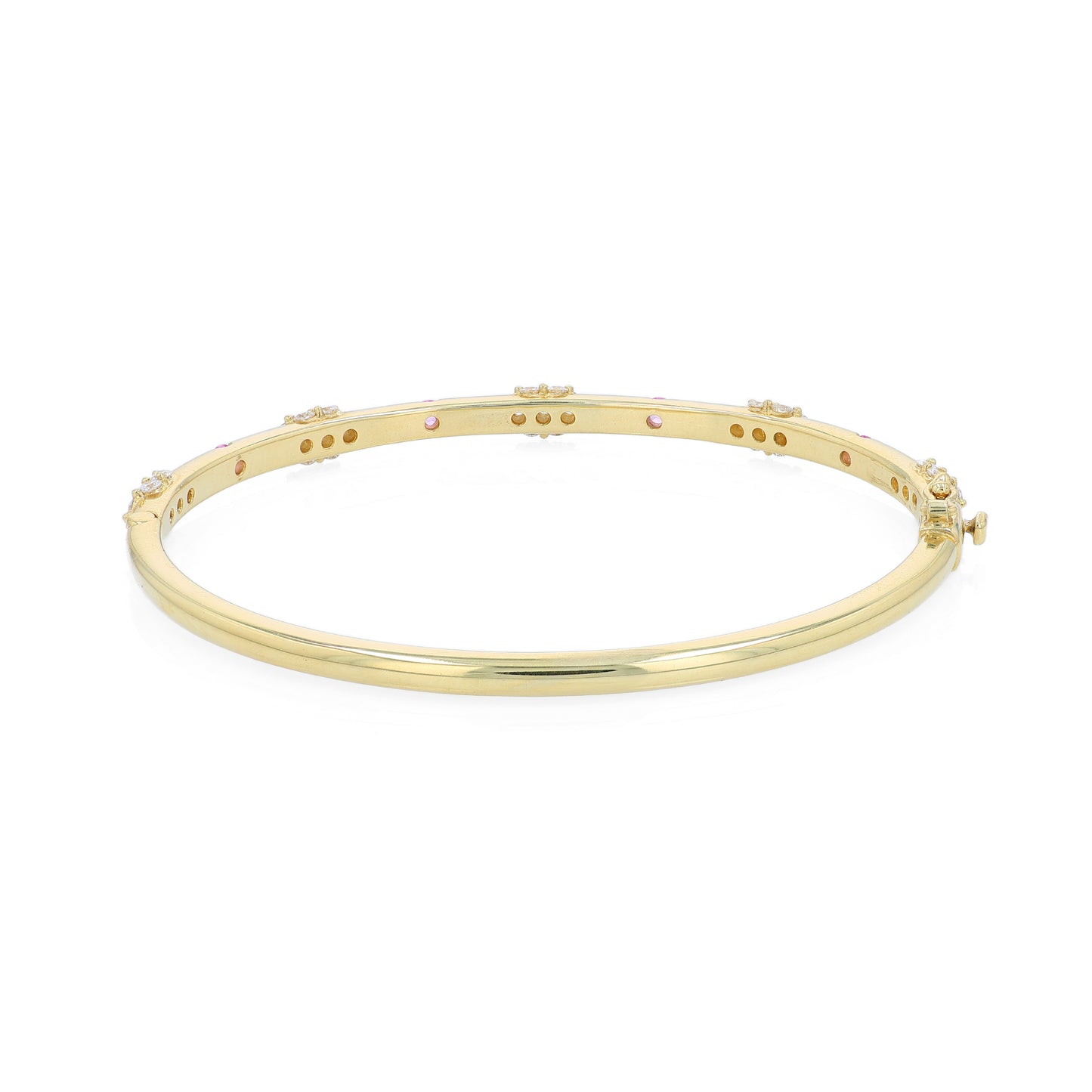 Yellow gold bracelet with pink sapphire and diamond accents on a white background