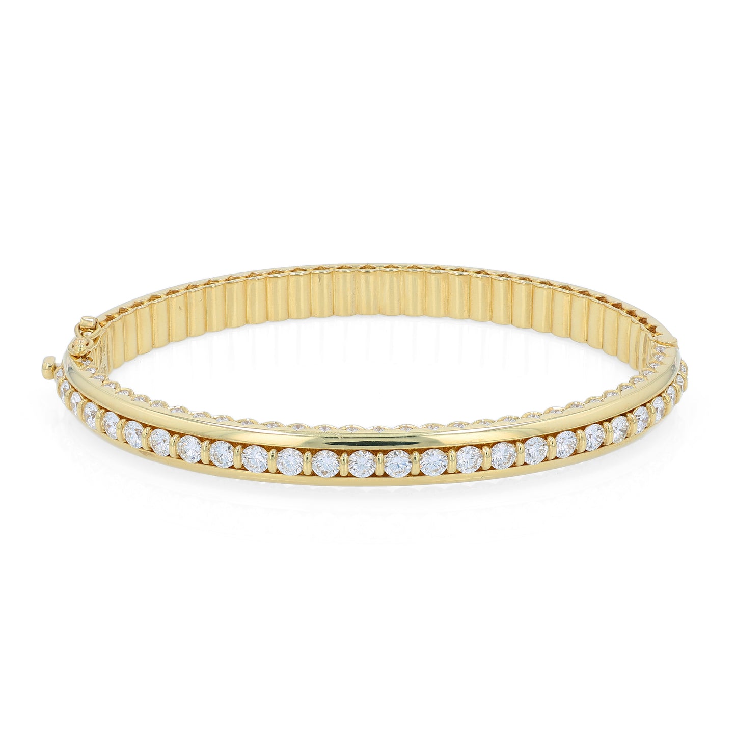 Yellow gold bracelet with a diamond center row on a white background
