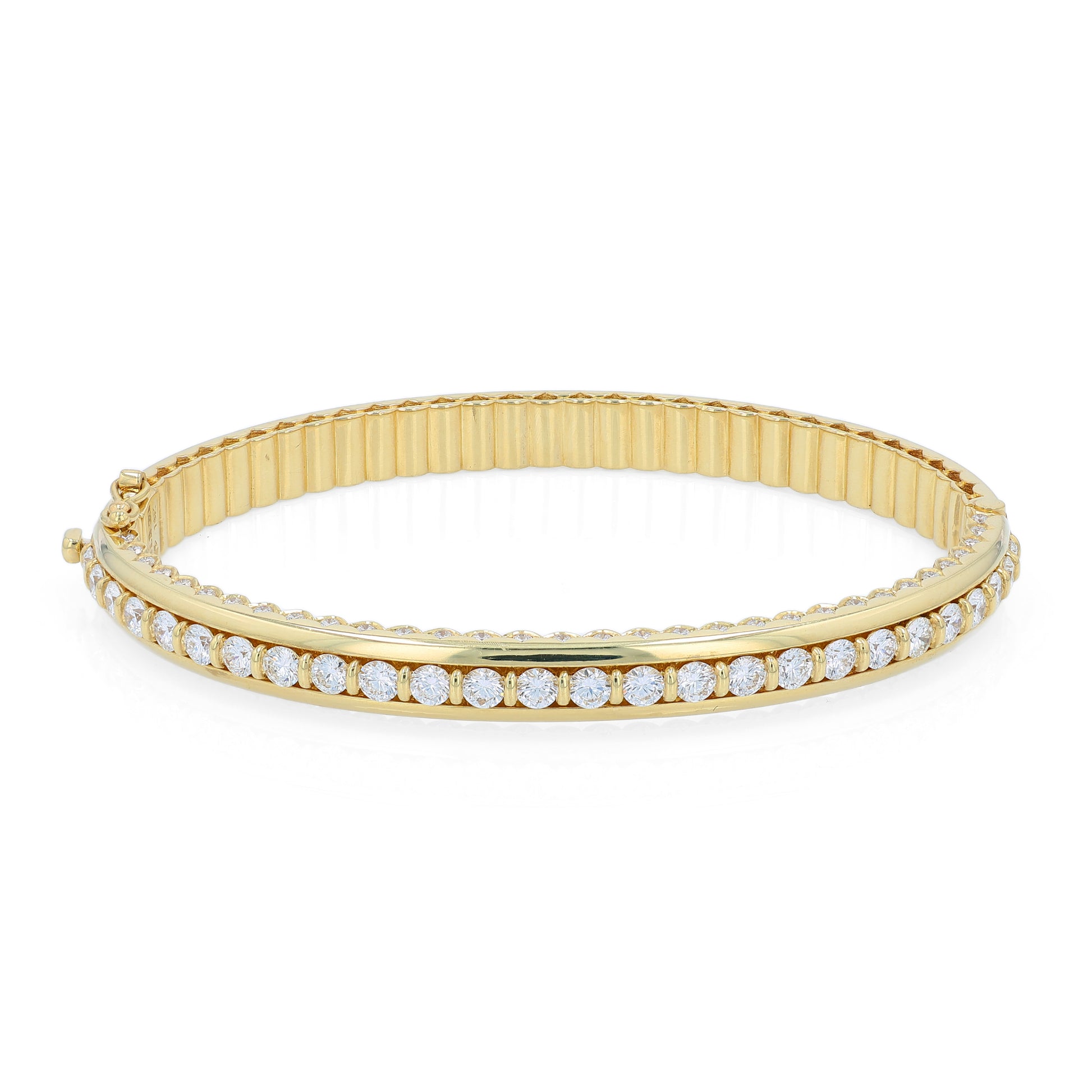 Yellow gold bracelet with a diamond center row on a white background