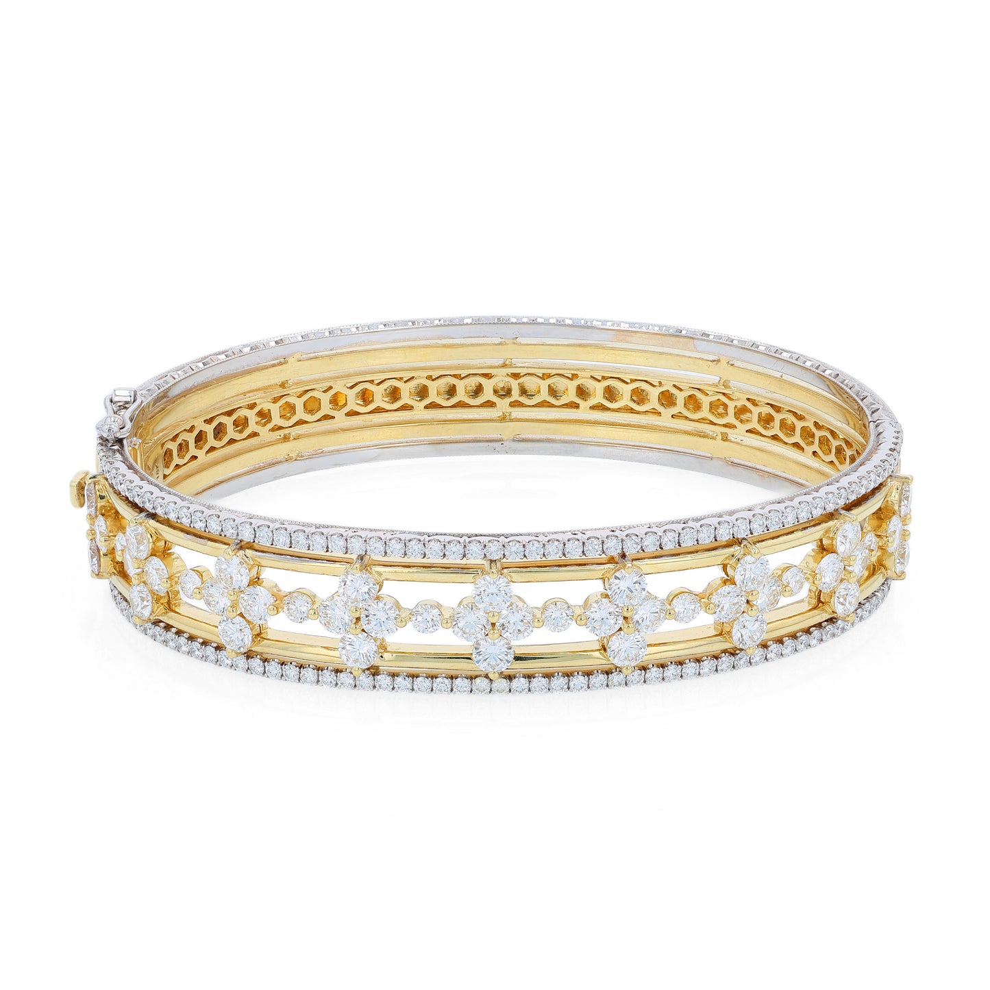 Two-tone gold bracelet with diamond edge and center accents on a white background