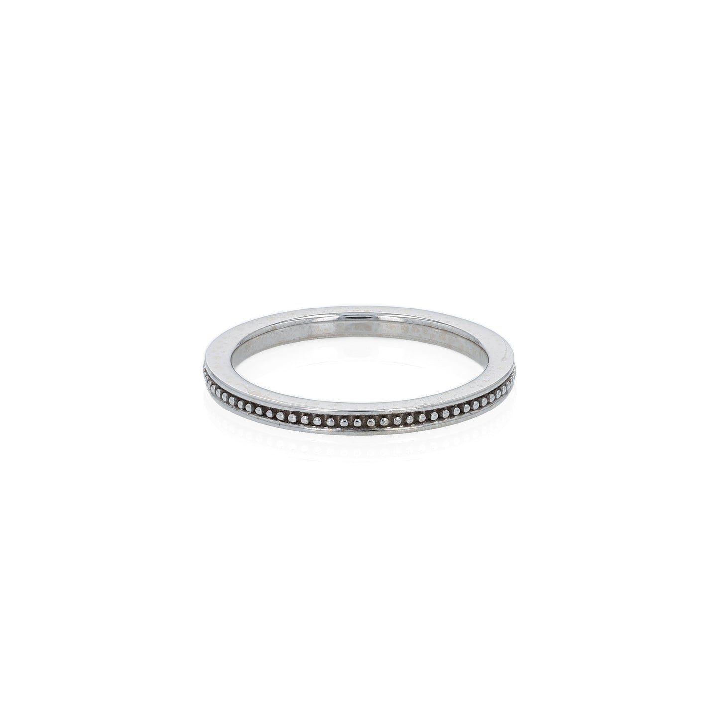 White gold ring with a milgrain center row on a white background