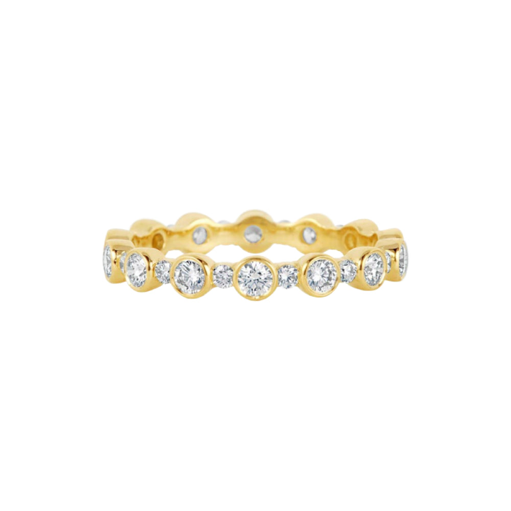 Yellow gold ring with embedded diamonds on a white background