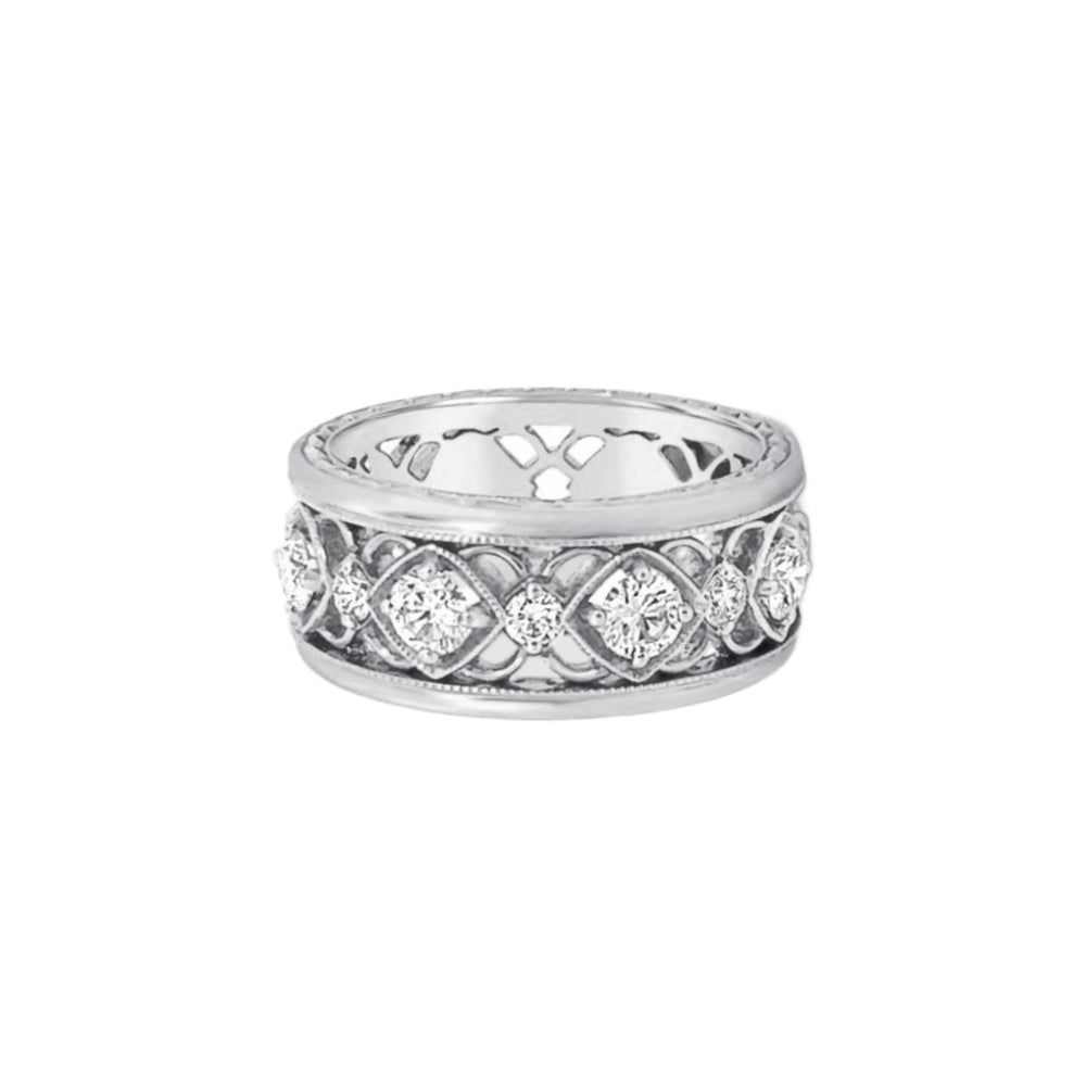 White gold open work ring with diamond accents on a white background