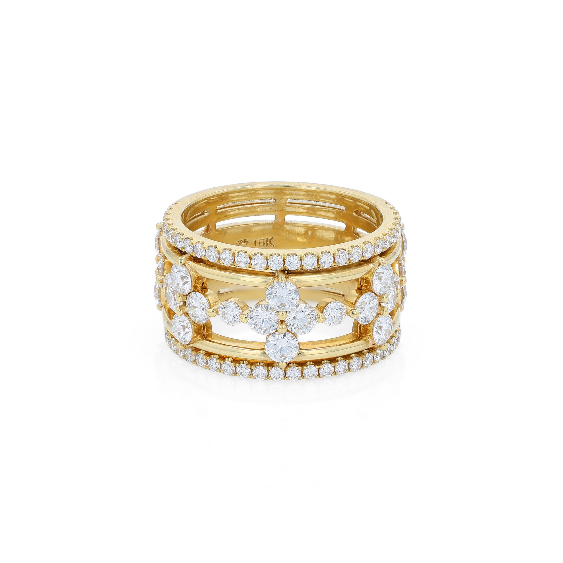 Yellow gold ring with diamond accents on a white background