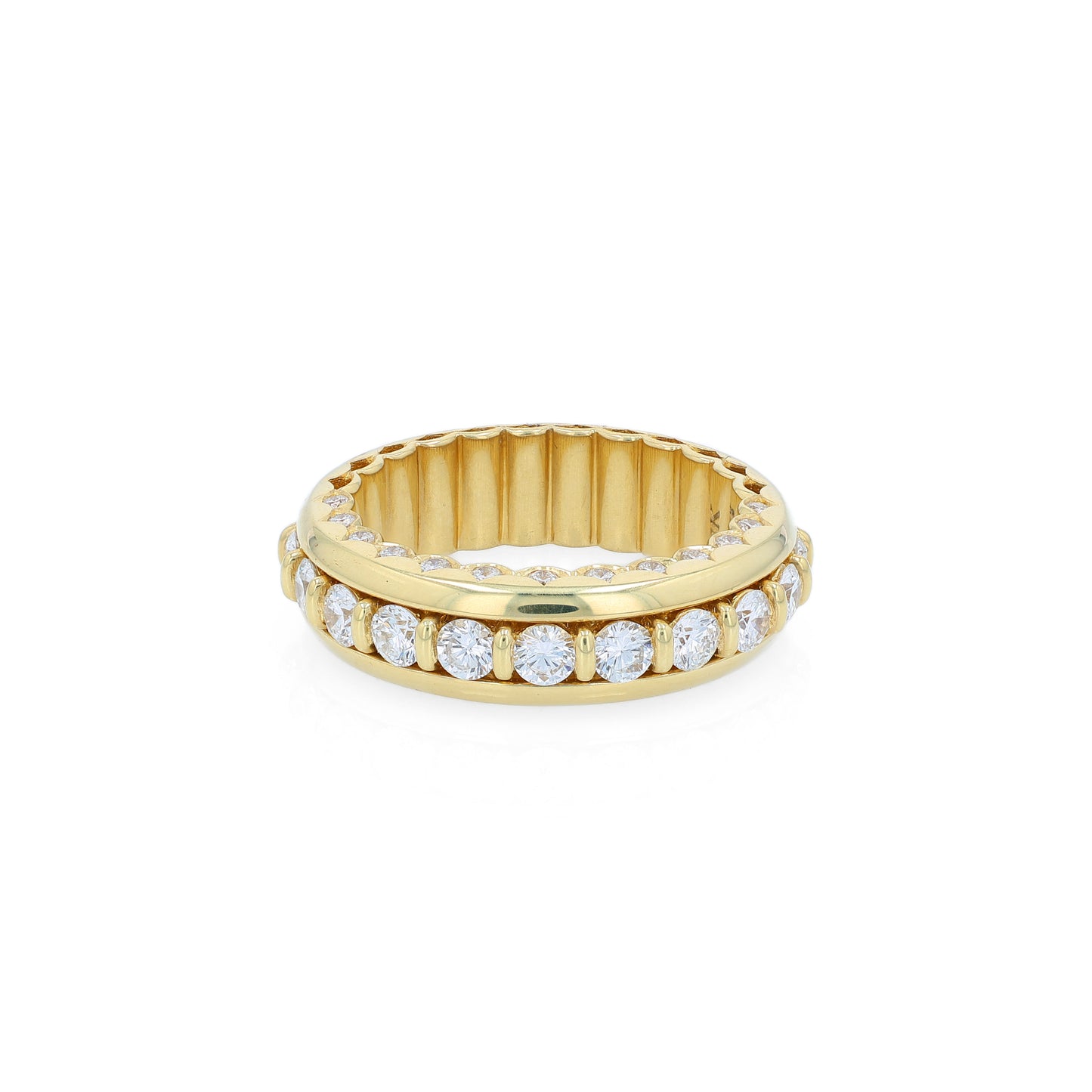 Yellow gold ring with diamond accents on a white background