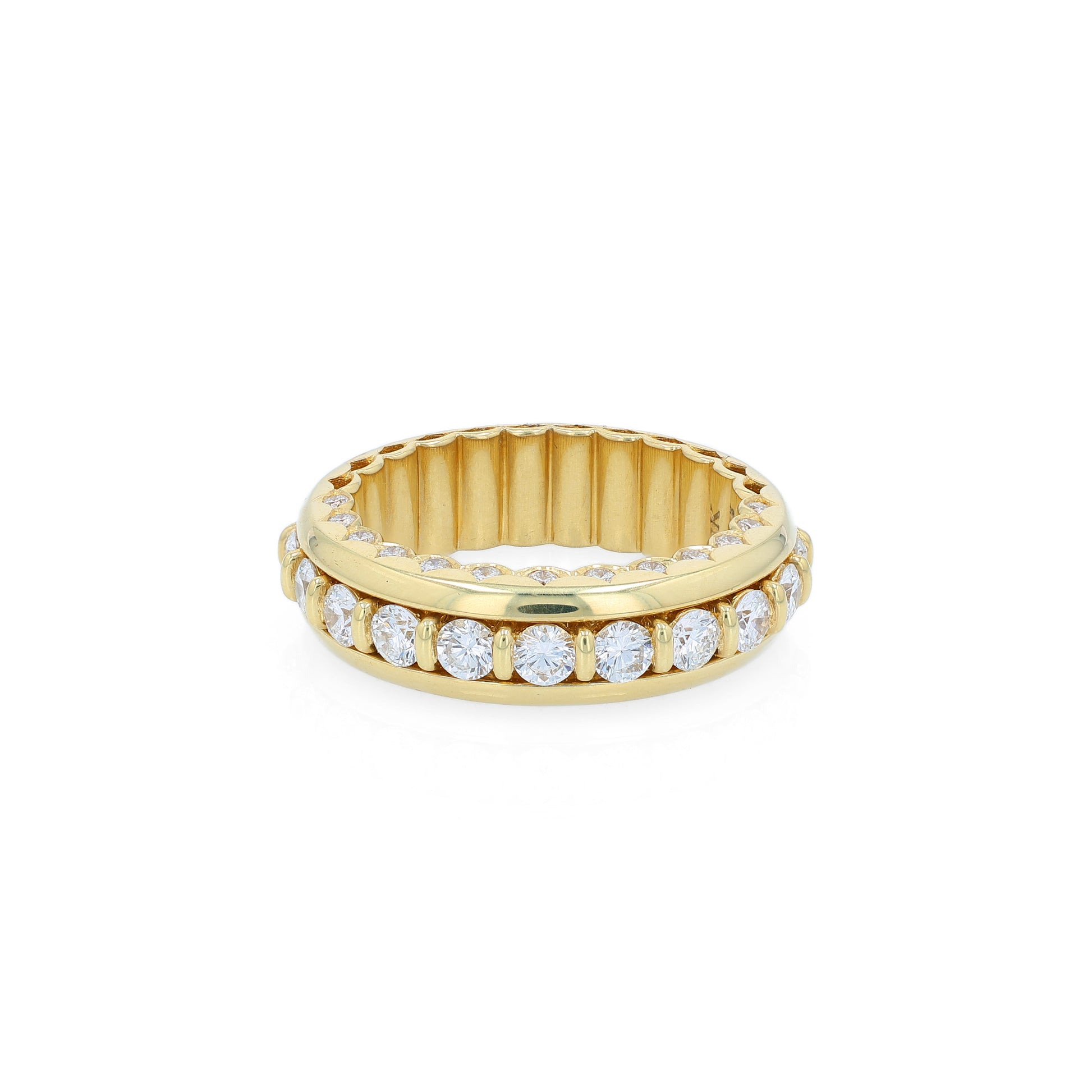 Yellow gold ring with diamond accents on a white background