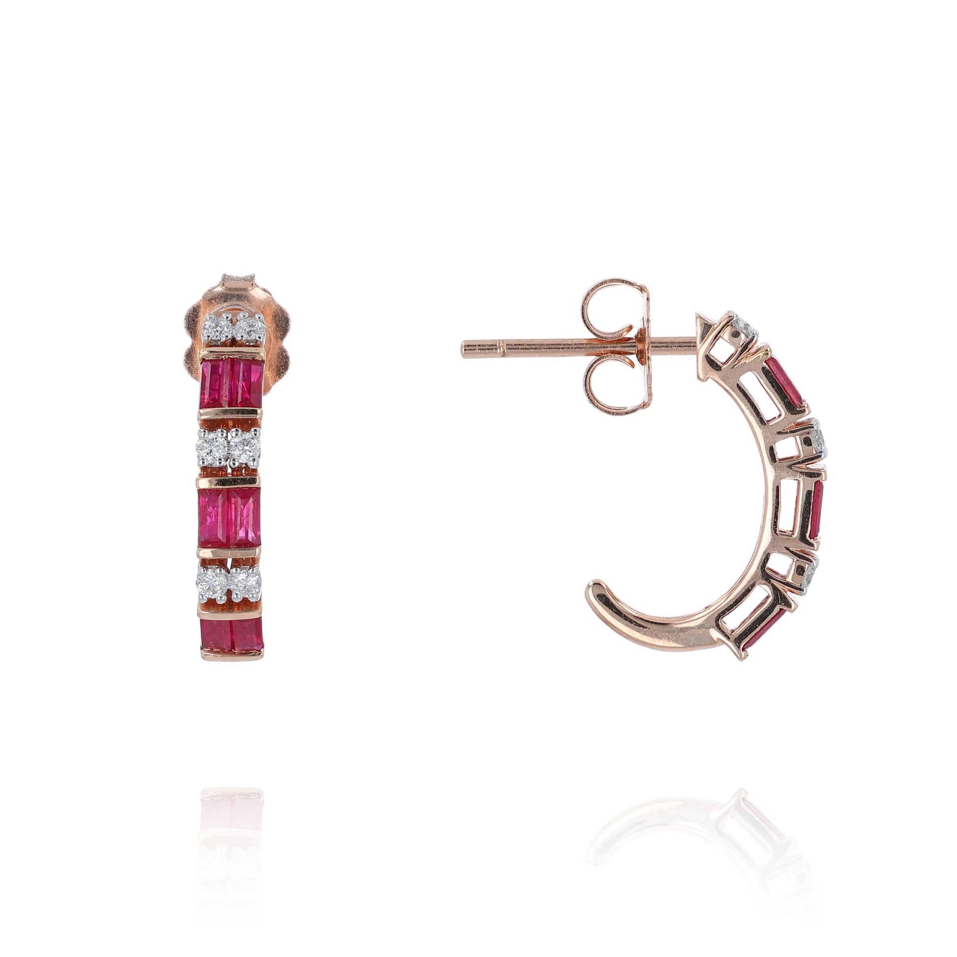Rose gold alternating diamond and ruby hoop earrings on a white background