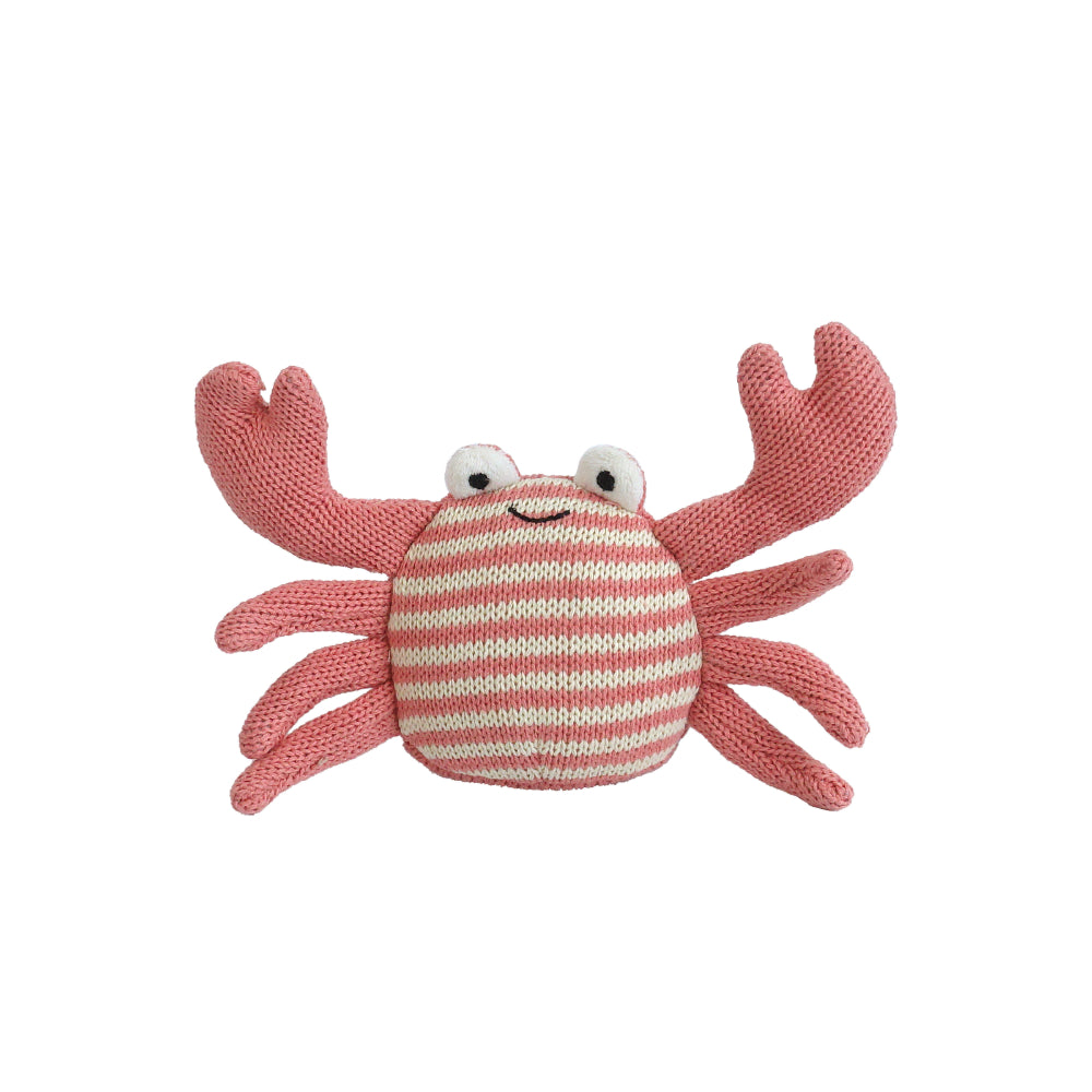 Knitted crab toy with pink and white striped body on a white background