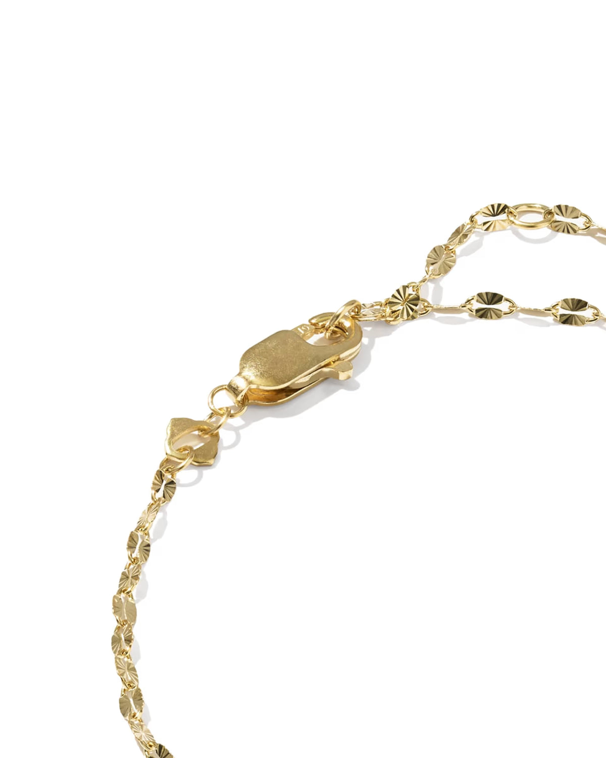 Close-up of a gold chain bracelet showing a lobster clasp, extender links, and textured oval links on a white background.