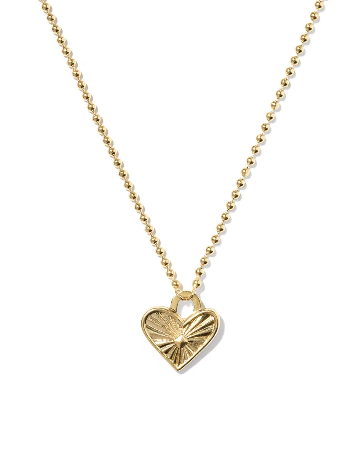 A gold ball chain necklace with a textured, sunburst-patterned heart pendant, shown on a clean white background.