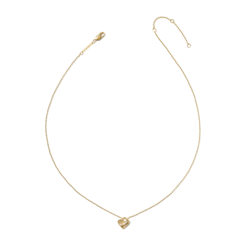 A delicate gold chain necklace with a small, textured heart-shaped pendant, displayed on a clean white background.