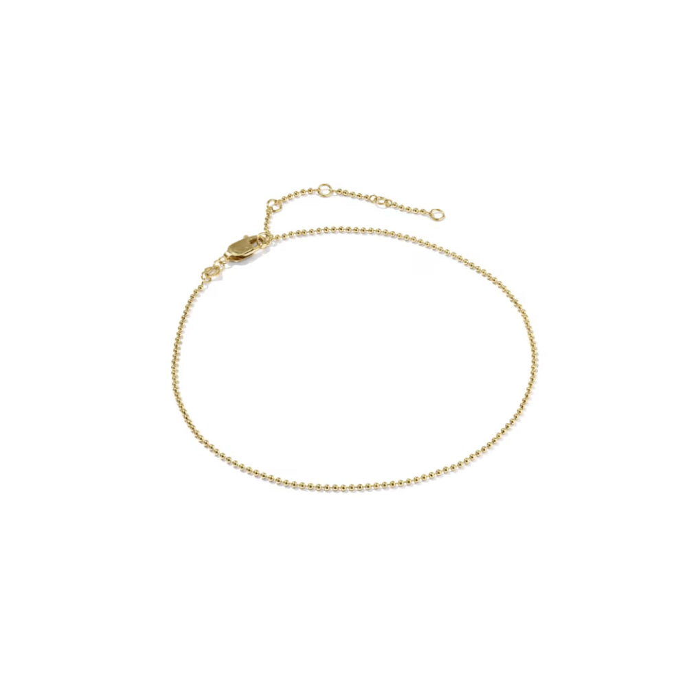 A delicate gold chain anklet with a lobster clasp and adjustable extender chain, displayed on a clean white background.