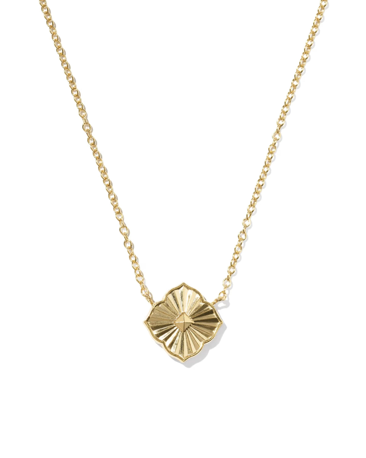 A delicate gold chain necklace featuring a textured, fan-shaped pendant with a central star motif, displayed on a clean white background.