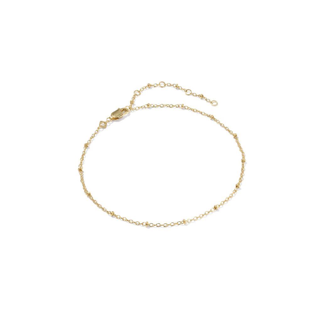 A delicate gold chain anklet with a lobster clasp and extender chain, displayed on a clean white background.