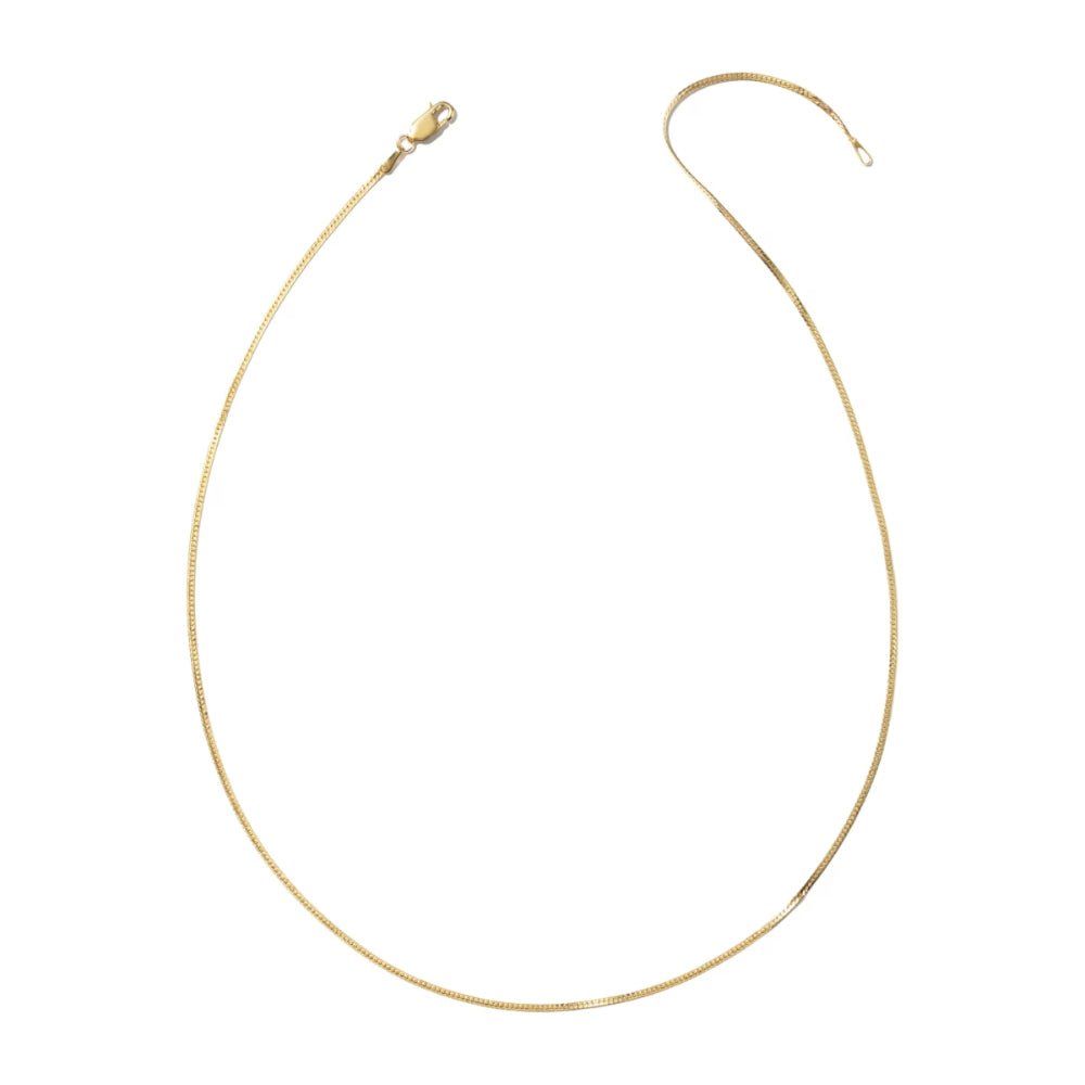 A delicate gold chain necklace with a lobster clasp and adjustable sliding ring, displayed on a clean white background.
