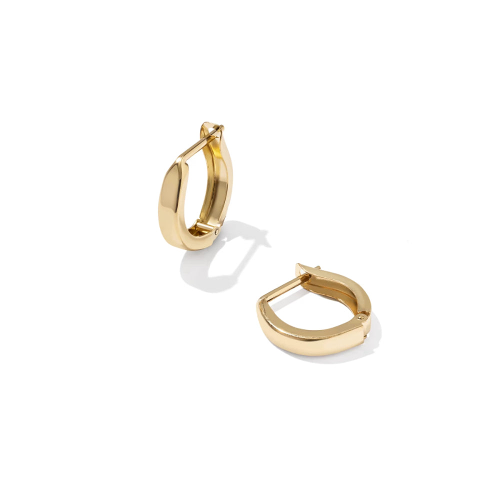A pair of polished yellow gold huggie hoop earrings shown on a clean white background with soft shadows.