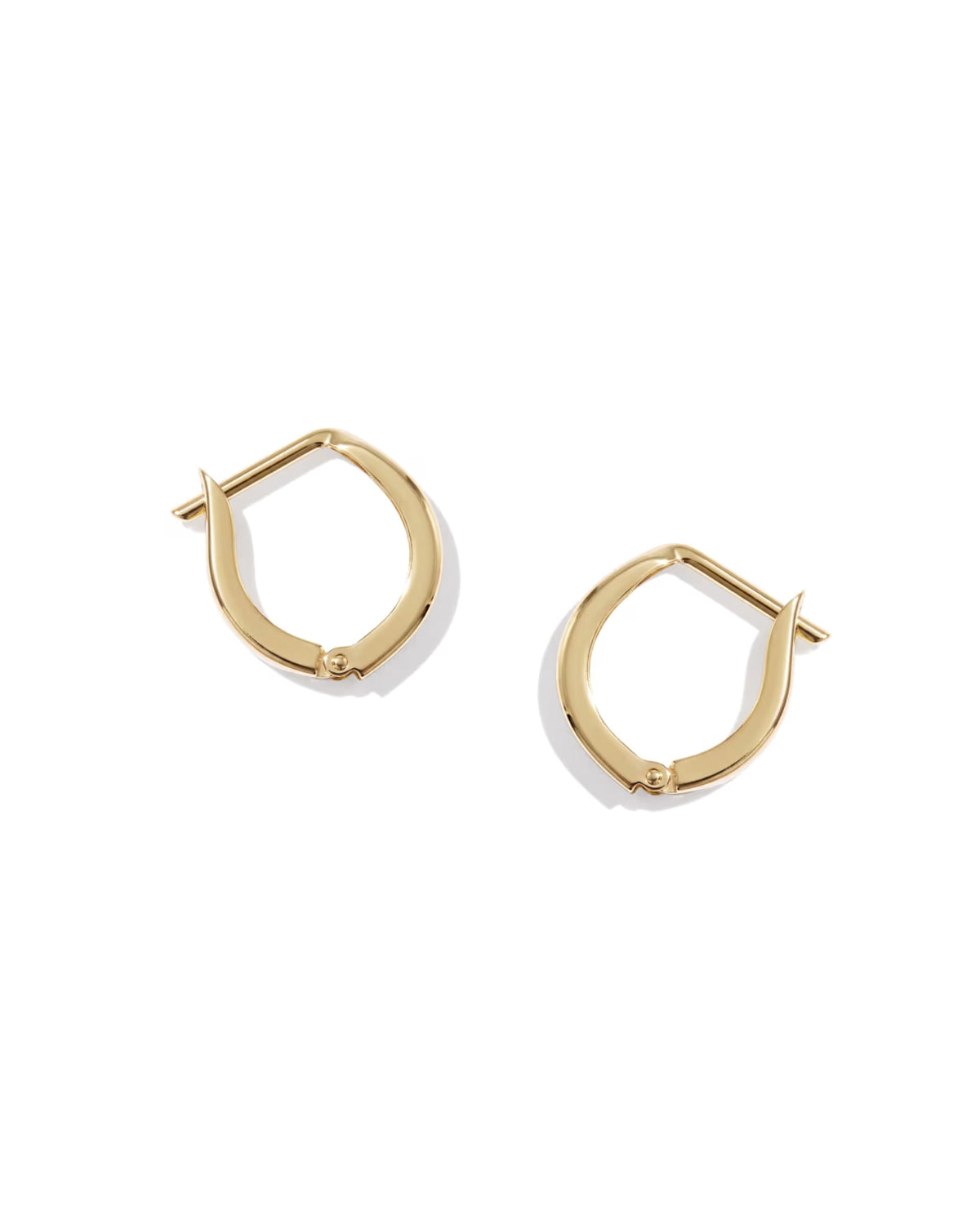 A pair of polished yellow gold huggie hoop earrings shown on a clean white background with soft shadows.