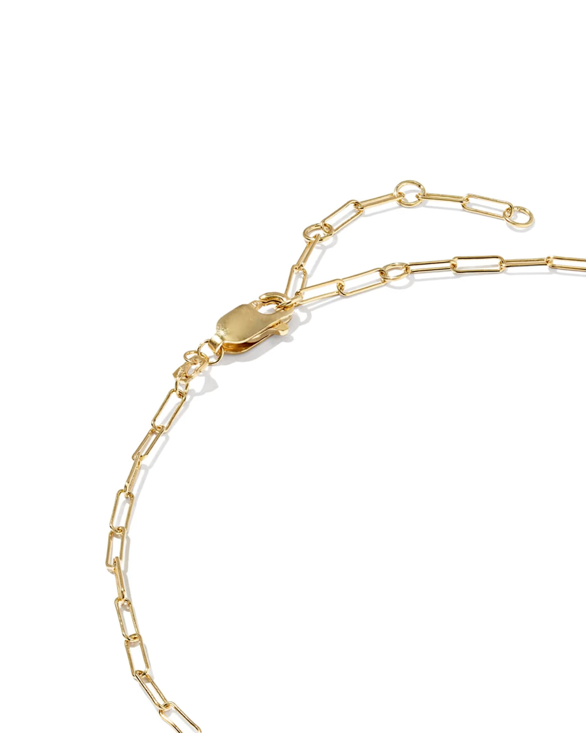 Close-up of a gold paperclip chain anklet with a lobster clasp and extension links on a white background.