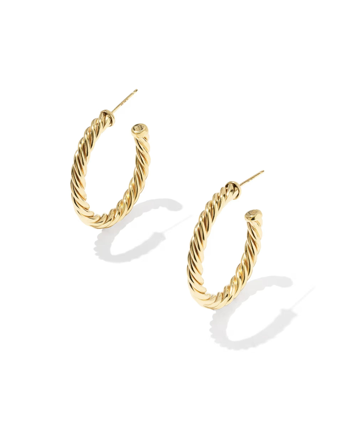 A pair of gold twisted hoop earrings with post backs, displayed on a clean white background with soft drop shadows.