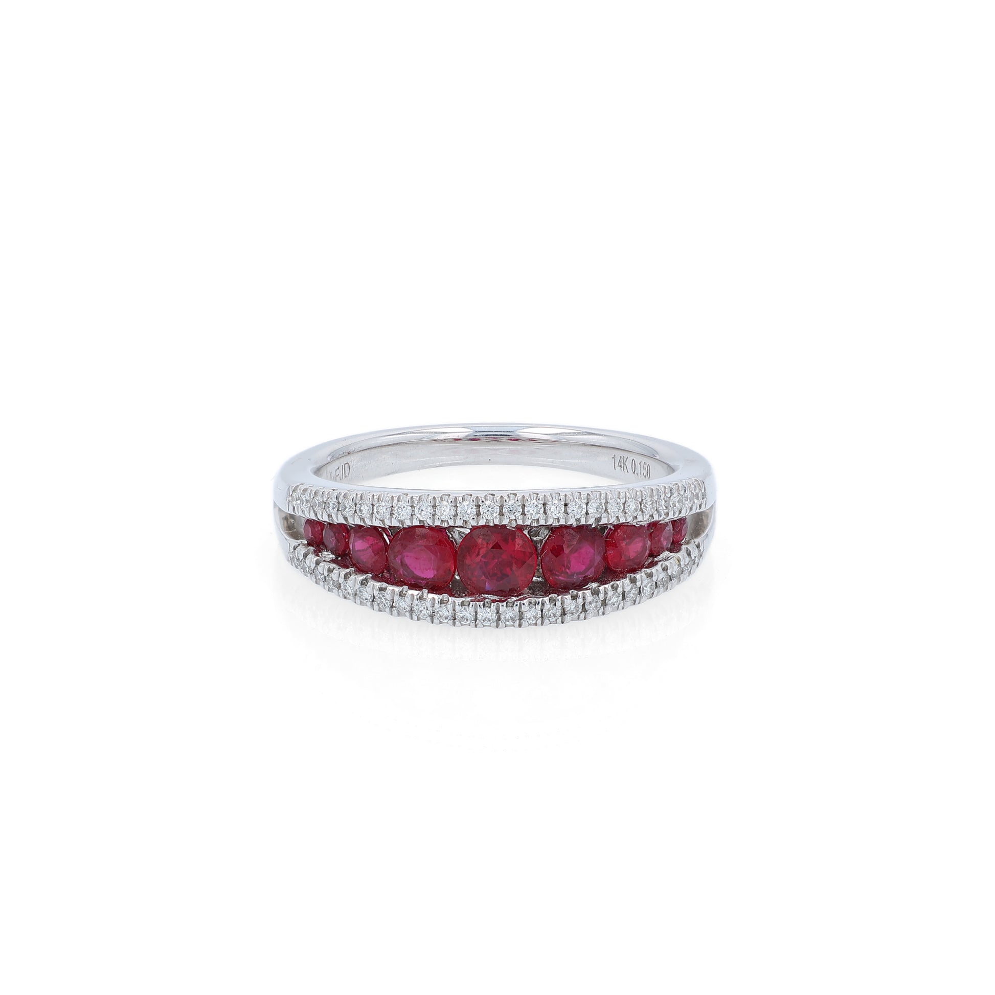 White gold ring with rubies and diamonds on a white background
