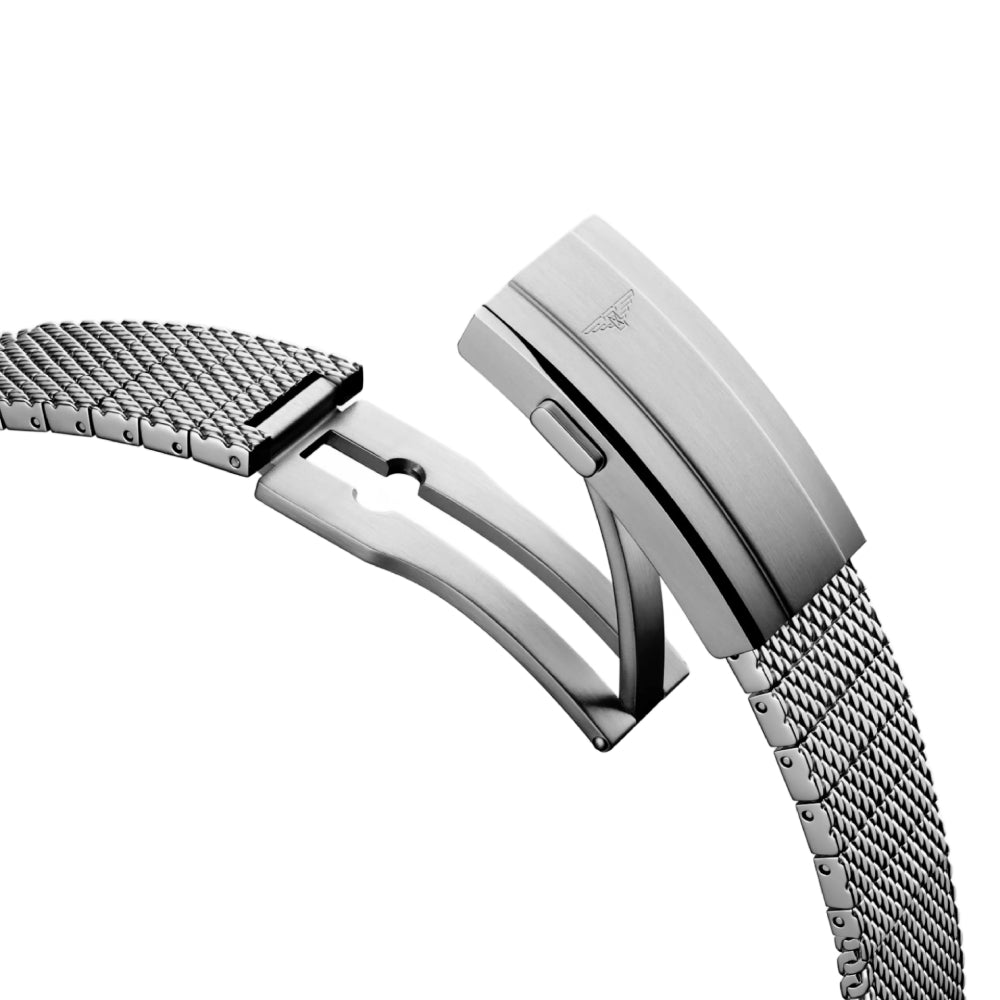 Close-up of a silver watch with a mesh band on a white background