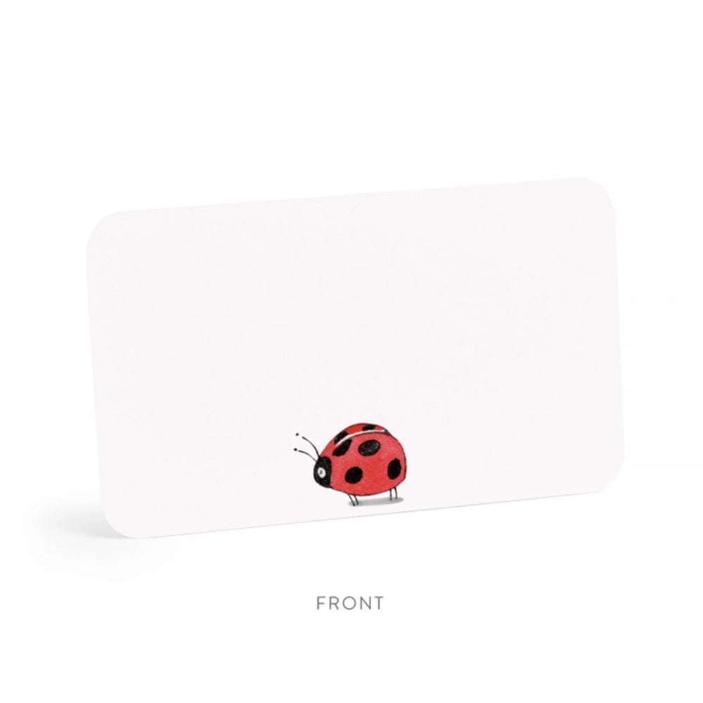 Note card with a ladybug illustration on a white background.