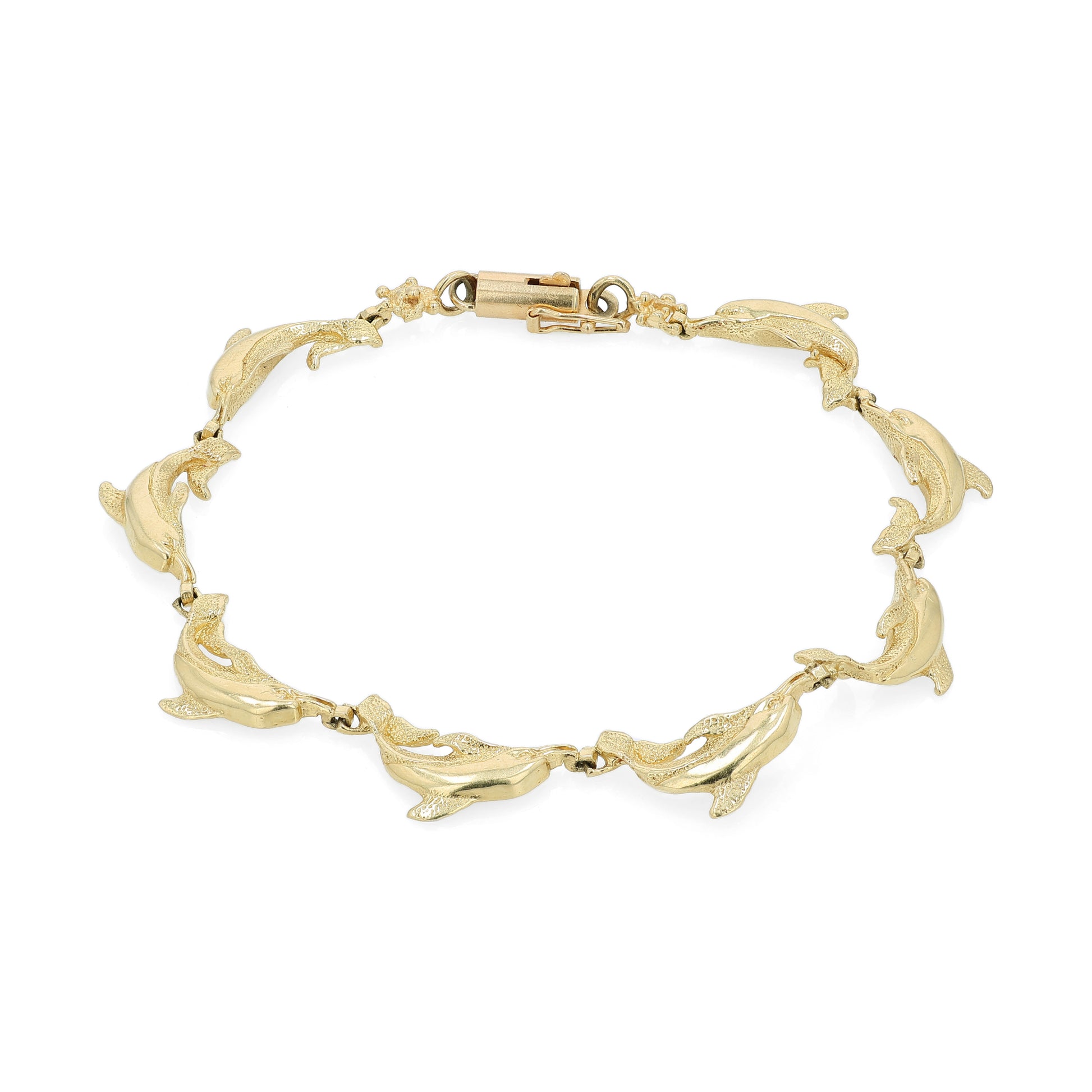 Yellow gold dolphin link bracelet on a white background