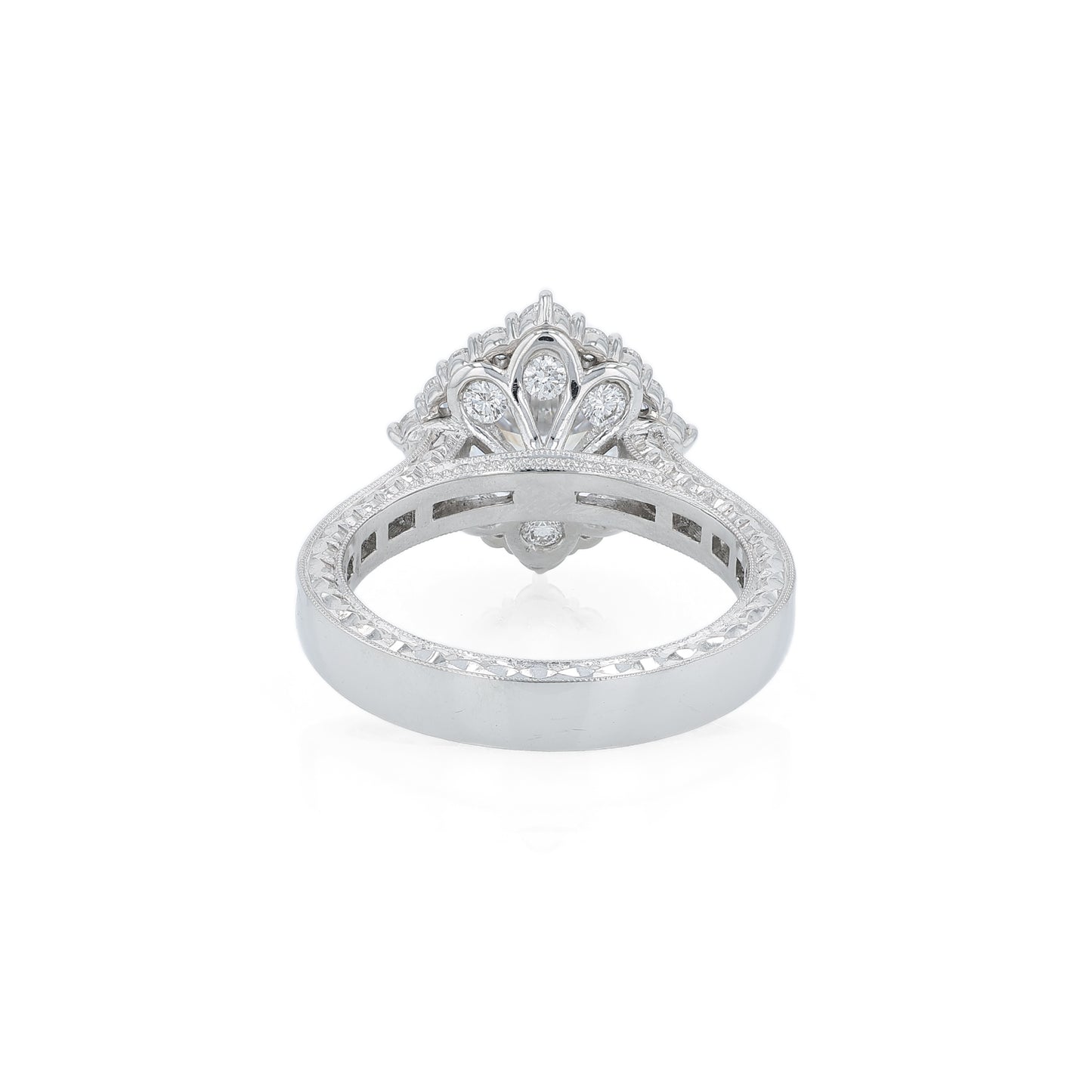 Platinum diamond halo engagement ring with diamond accents and a round cubic zirconia center on a white background