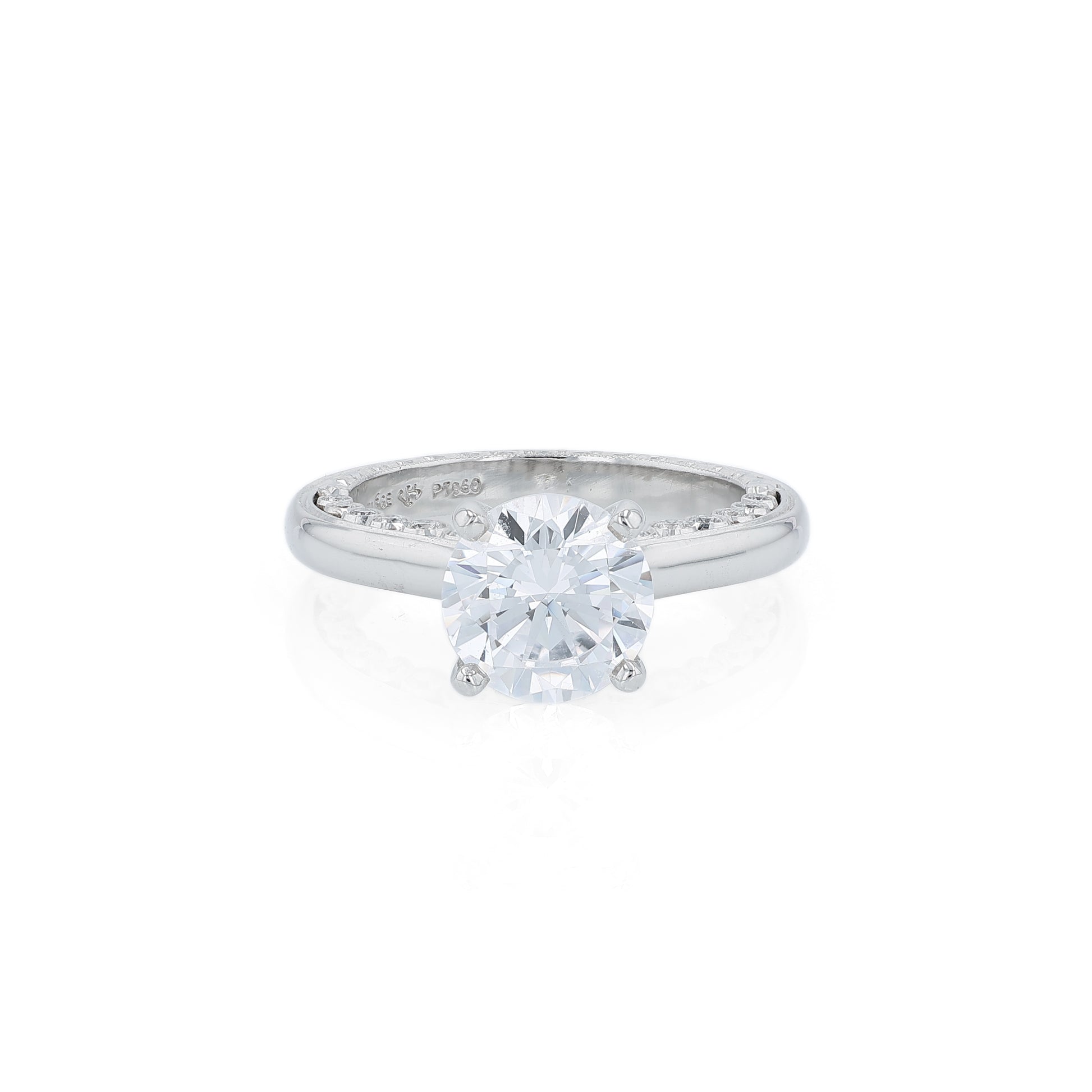 Platinum diamond engagement ring with diamond accents a round cubic zirconia center on a white background