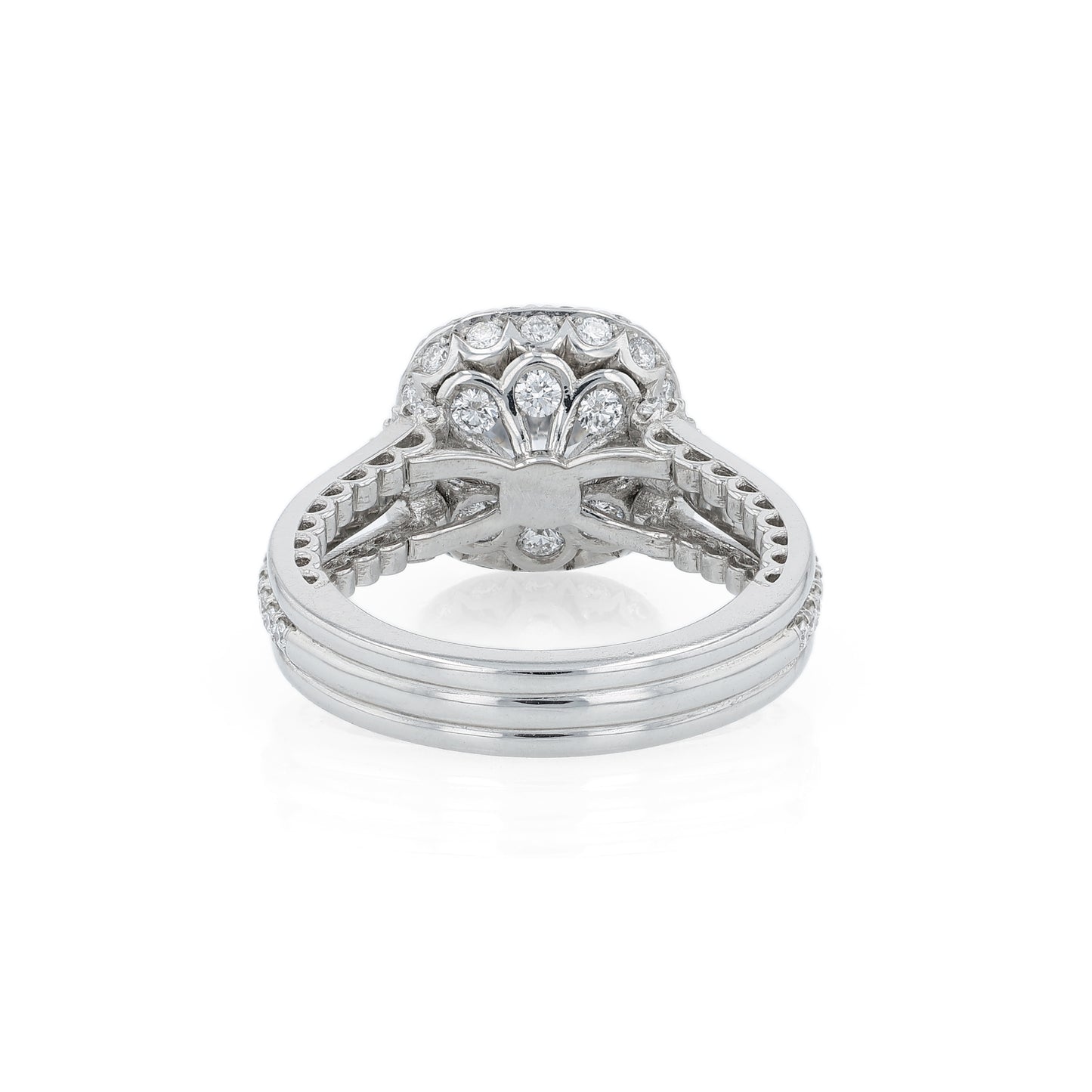 Platinum diamond halo engagement ring with diamond accents and a round cubic zirconia center on a white background