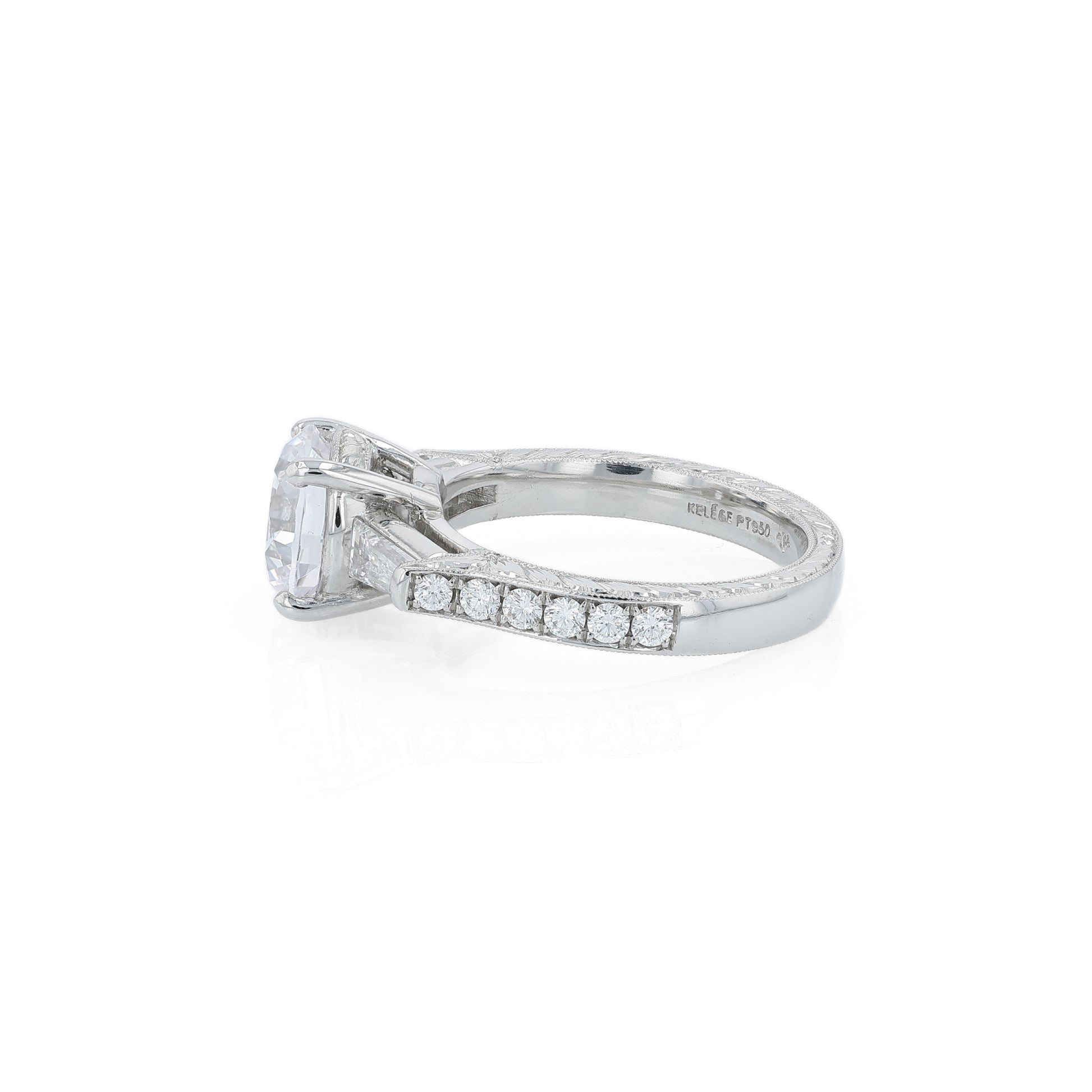 Platinum diamond engagement ring with diamond accents and a round cubic zirconia center on a white background