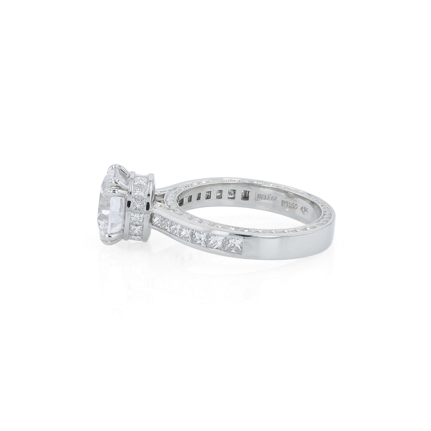 Platinum diamond engagement ring with diamond accents and a round cubic zirconia center on a white background
