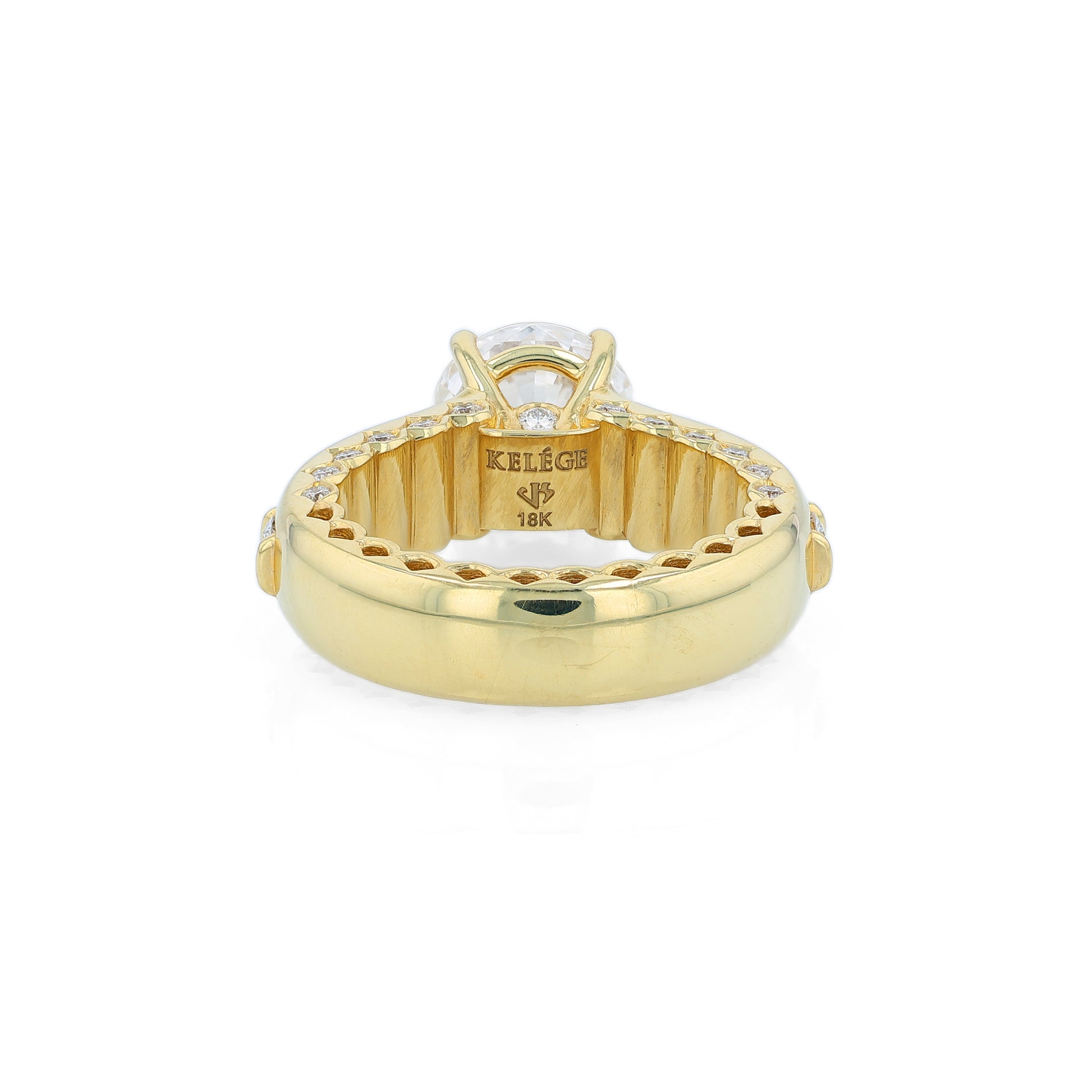 Yellow gold diamond engagement ring with diamond accents and a round cubic zirconia center on a white background