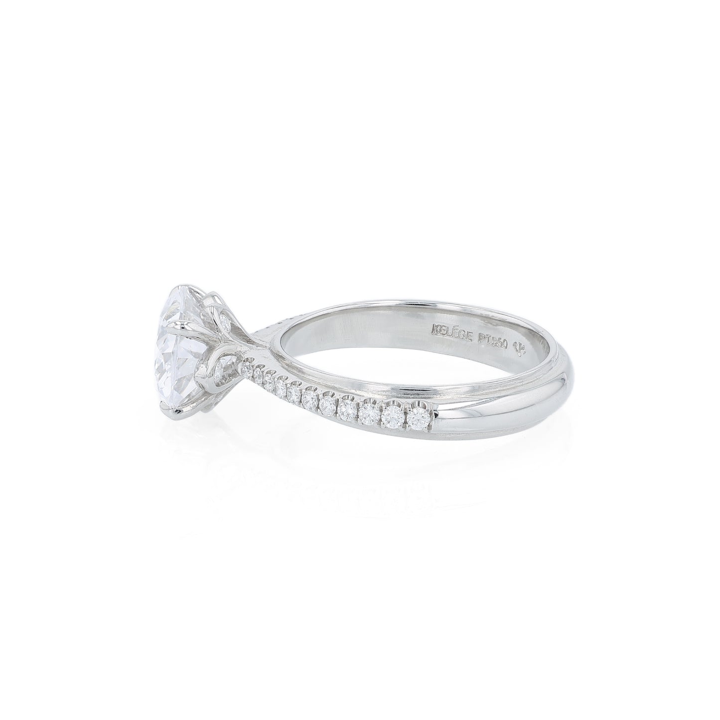 Platinum diamond engagement ring with diamond accents and an oval cubic zirconia center on a white background