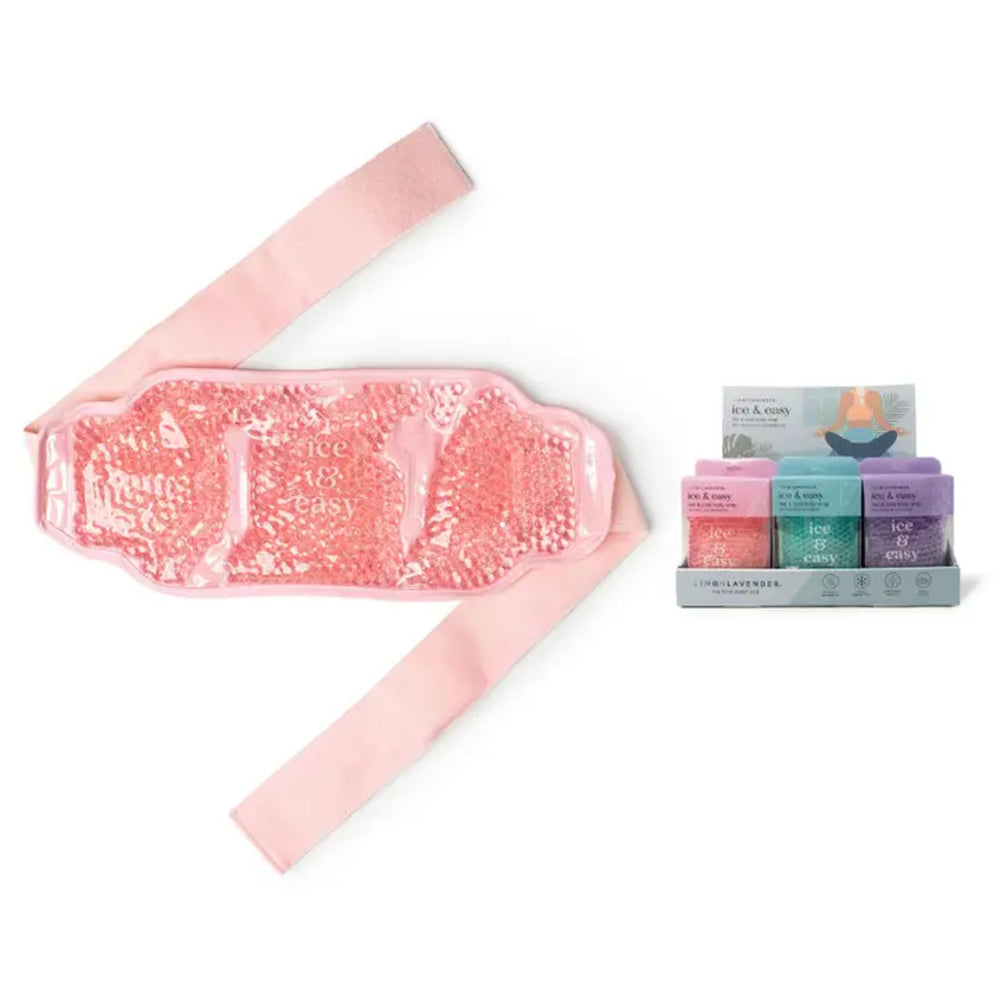 Pink gel pack with a strap and a set of small containers on a white background