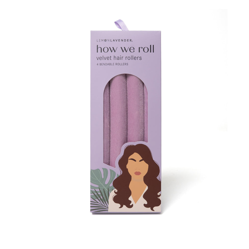Purple packaging of 'how we roll' velvet hair rollers with a woman's face on the front.