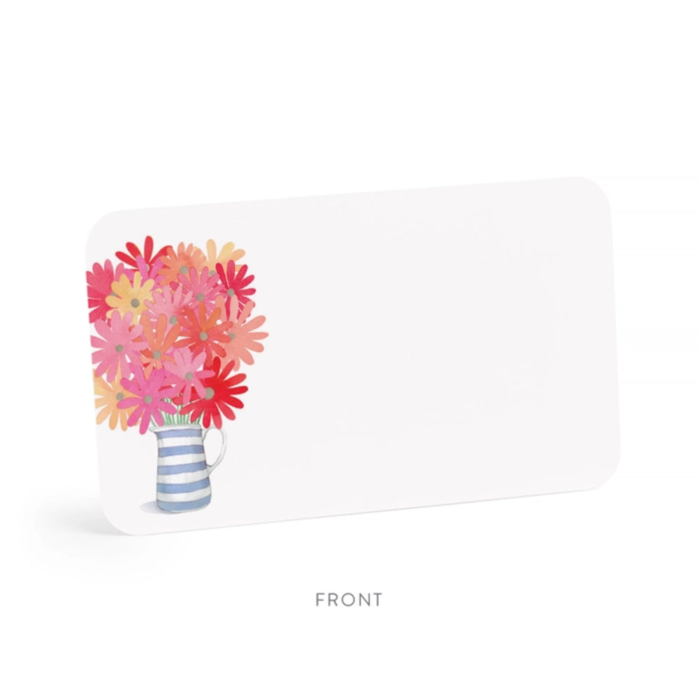 Front of card with a bouquet of colorful flowers in a striped vase on a white background.