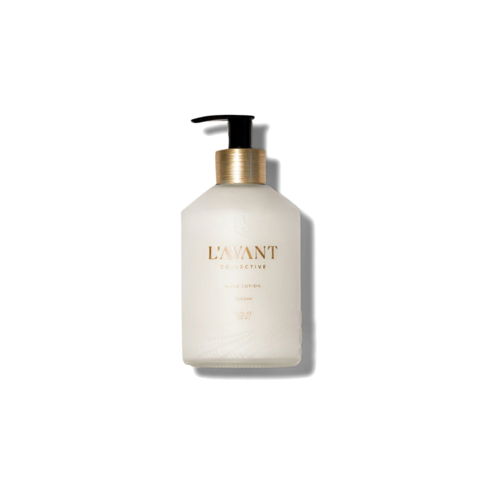 A frosted glass pump bottle of L'avant Collective body lotion with a black pump and gold collar, centered on a white background with a soft shadow.